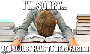 Young person facedown on an open book with other books around them